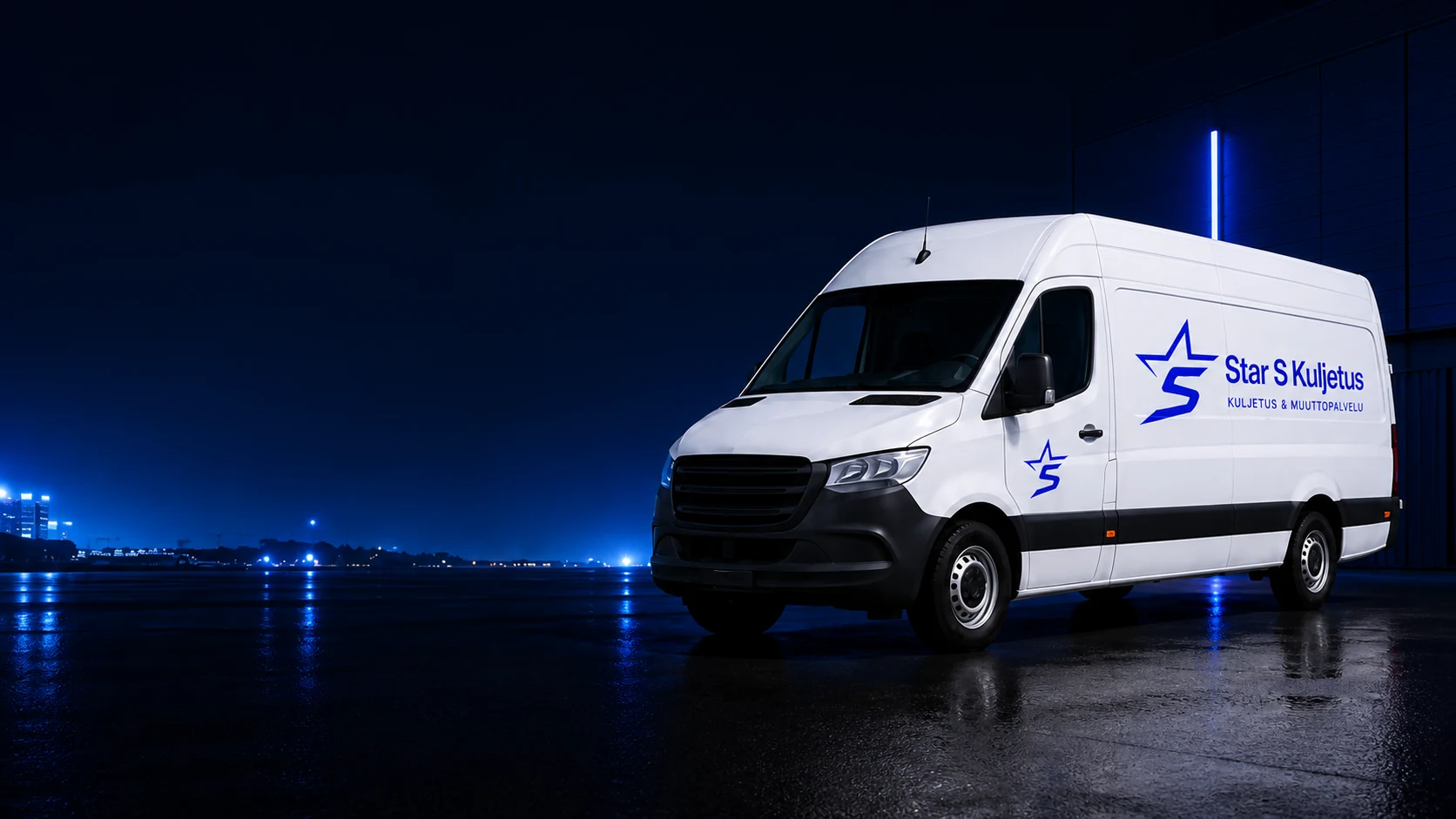 Star-S Kuljetus white van at a harbour site at night
